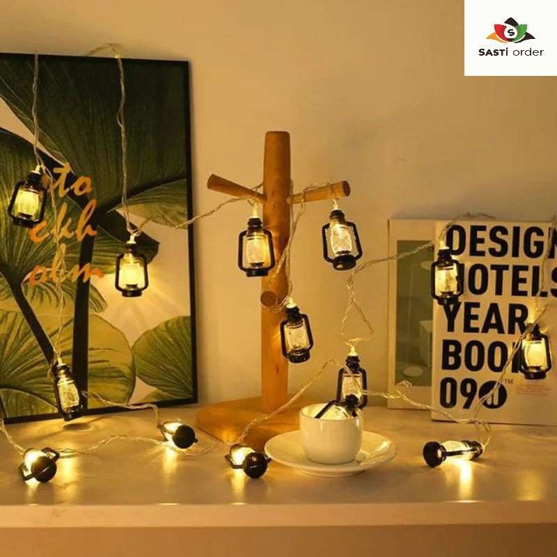 Mini Lanterns with intricate designs, perfect for adding warmth and charm to any indoor or outdoor decor.