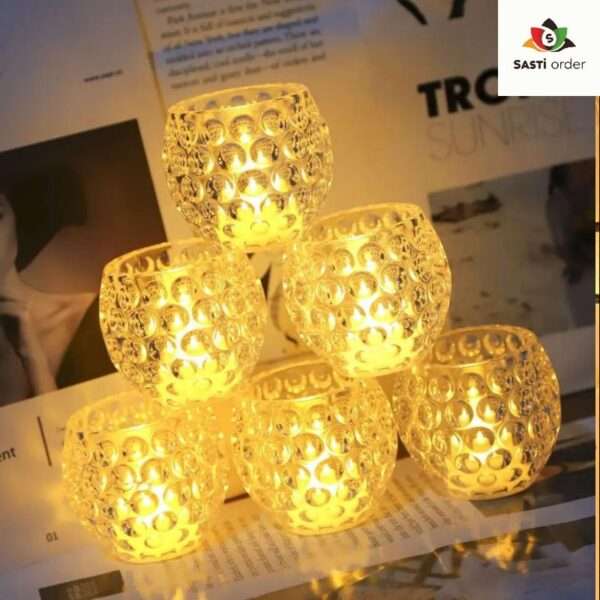 A sleek, honeycomb-patterned clear plastic LED candle holder that mimics the look of crystal, designed to beautifully refract light from flameless candles, adding a modern and elegant touch to any room or event.