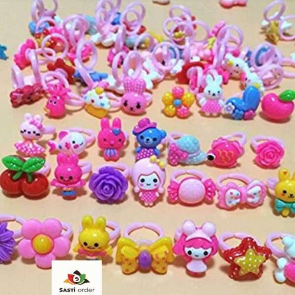 A collection of colorful heart shape kids fancy rings, designed for children, showcasing vibrant hues and playful designs, perfect for dress-up and special occasions.