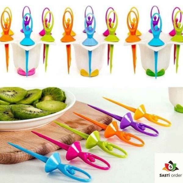 A set of Multicolour Fiber Dancing Doll Fruit Forks, showcasing vibrant colors and playful dancing doll designs, arranged on a colorful tablecloth with fruit and snacks in the background.