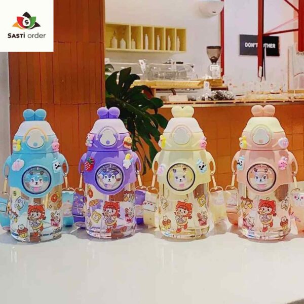 "Travel school cute animal water bottle with vibrant animal designs, placed on a school desk with stationery."