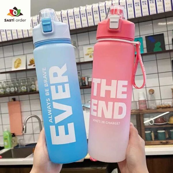 "Transparent bear shape kids water bottle, designed with an adorable bear face and clear body, displayed on a colorful table with school supplies."