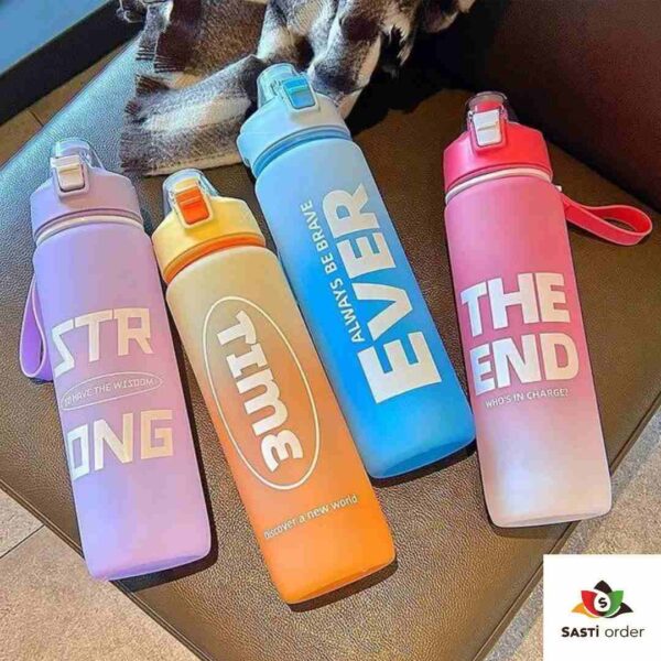 "Large capacity plastic water bottle with a wide mouth design, filled with water and placed on a wooden table, showcasing its lightweight and durable features."