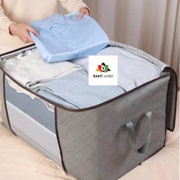 Quilt Storage Bag with transparent window and handles, designed to protect and organize quilts and bedding.