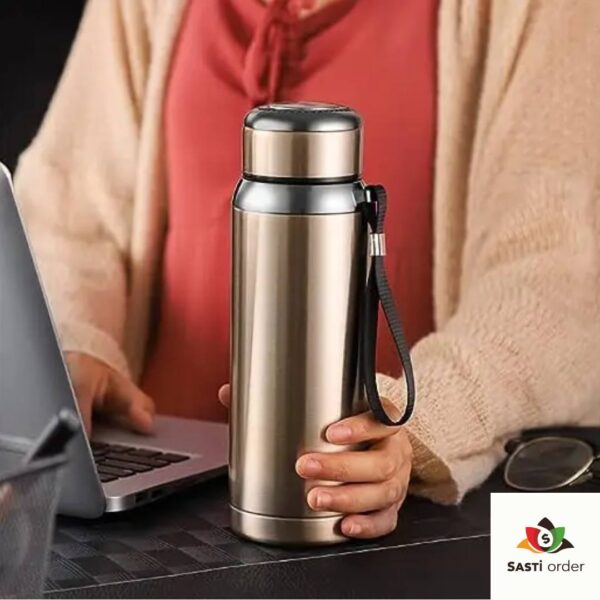 "Sports Vacuum Insulated Stainless Steel Water Bottle with a wide mouth opening and leak-proof lid, designed to keep drinks cold for 24 hours and hot for 12 hours."