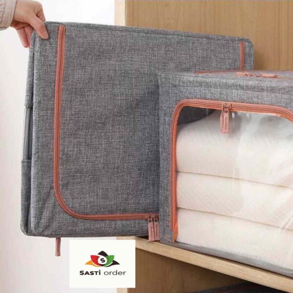 24 Litre Foldable Storage Bag with durable material, clear window, and sturdy handles for easy storage and organization of clothes, bedding, and other items.