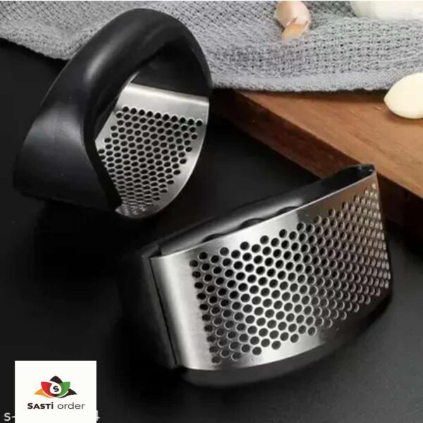 Stainless steel garlic press with ergonomic handles, perfect for mincing garlic quickly and easily.
