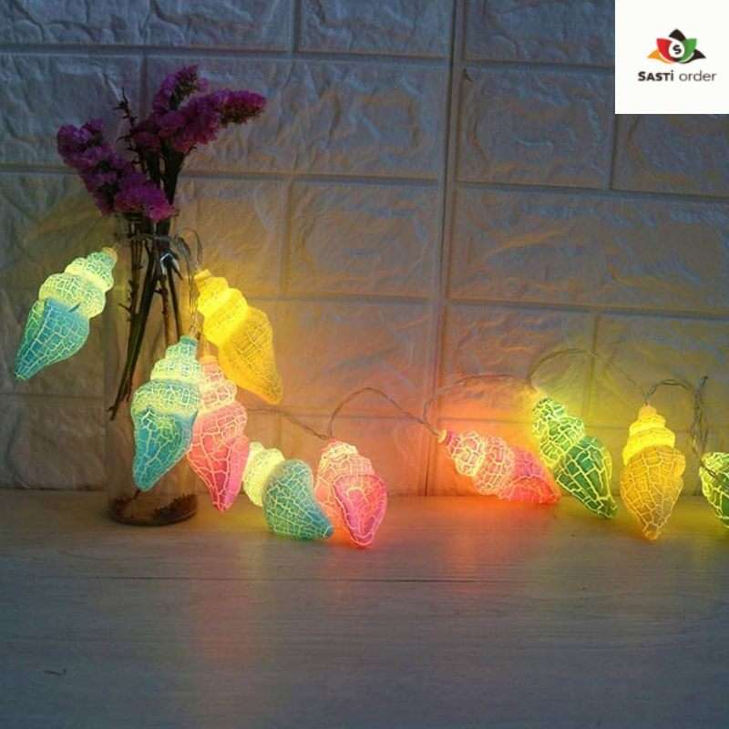 10 LED Shell Shape String Light providing a soft, coastal-inspired glow for indoor and outdoor decor.